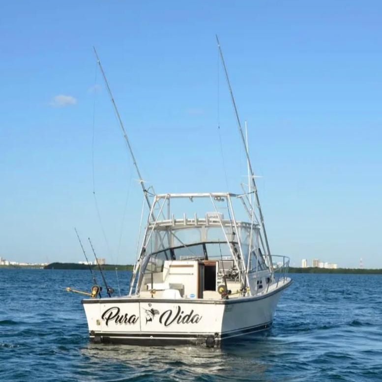Pura Vida 35ft luxury yacht rental Cancun - Intimate boat charter for 6 people with premium amenities and fishing gear