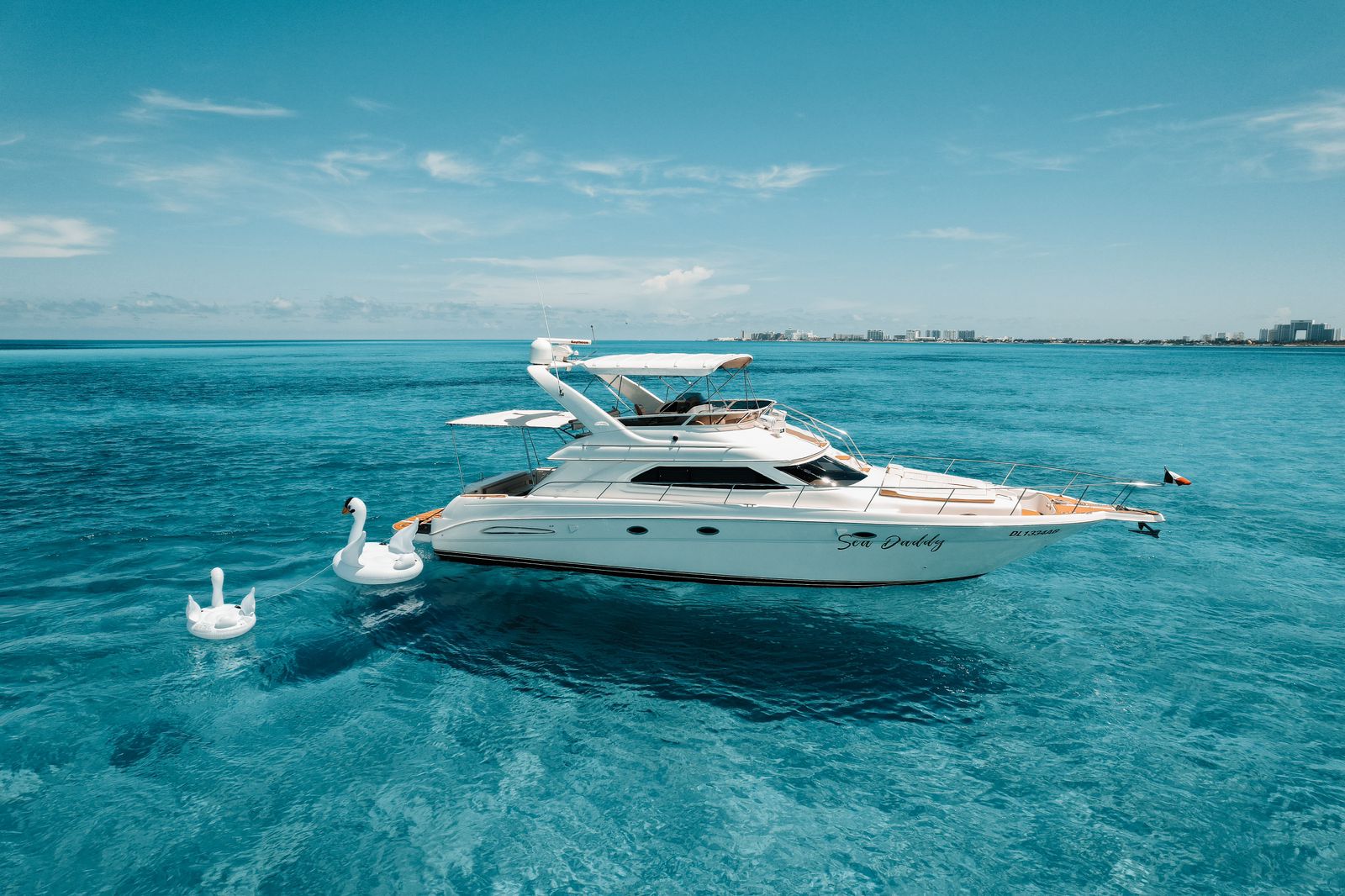 Sea Daddy 50ft luxury yacht charter Cancun - Premium boat rental for 22 people with drinks and snorkeling gear included